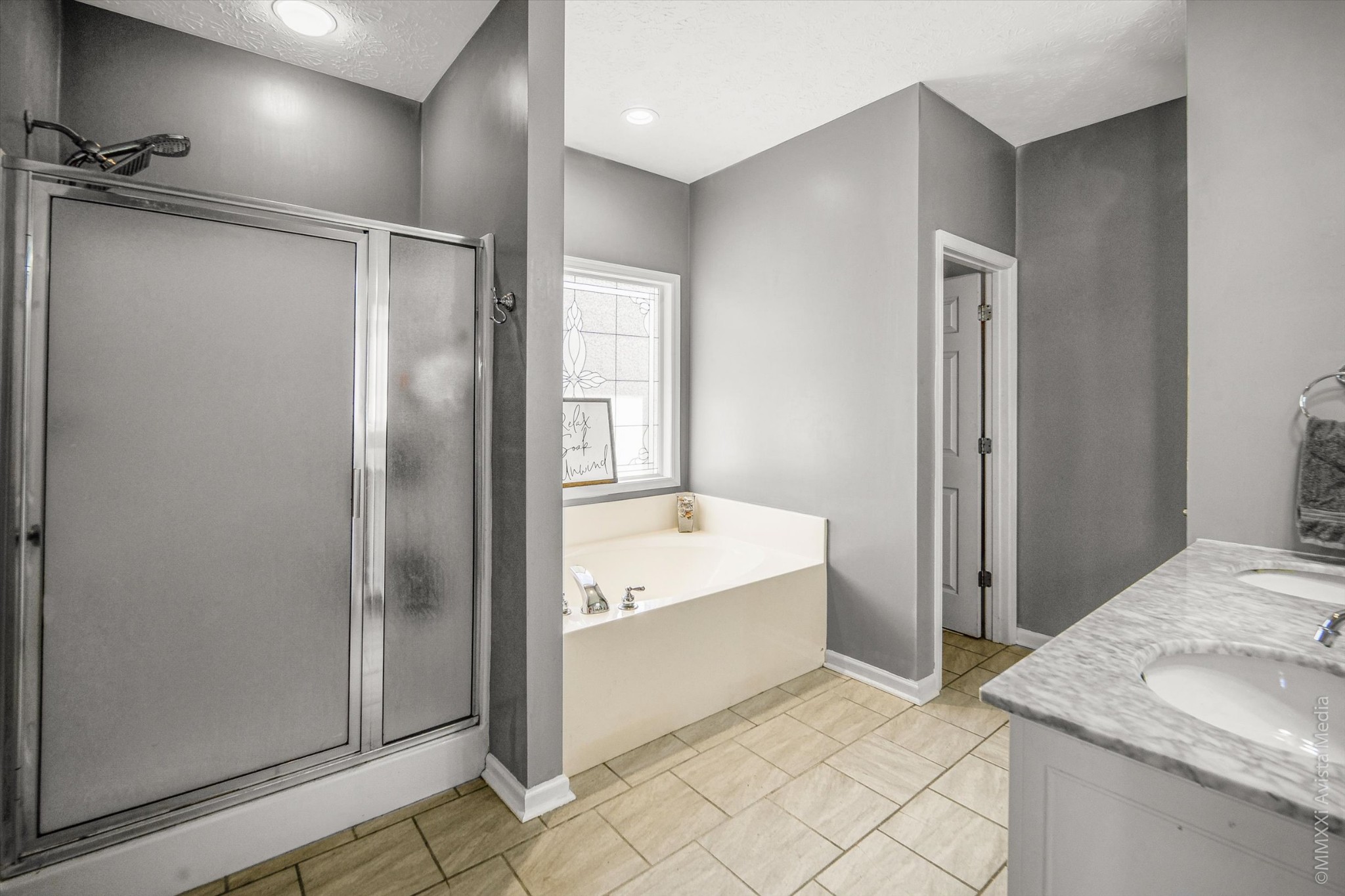 14908 Mt Pleasant Road Rockvale, TN 37153 - Photo 14 of 33 a bathroom with a tub shower and sink