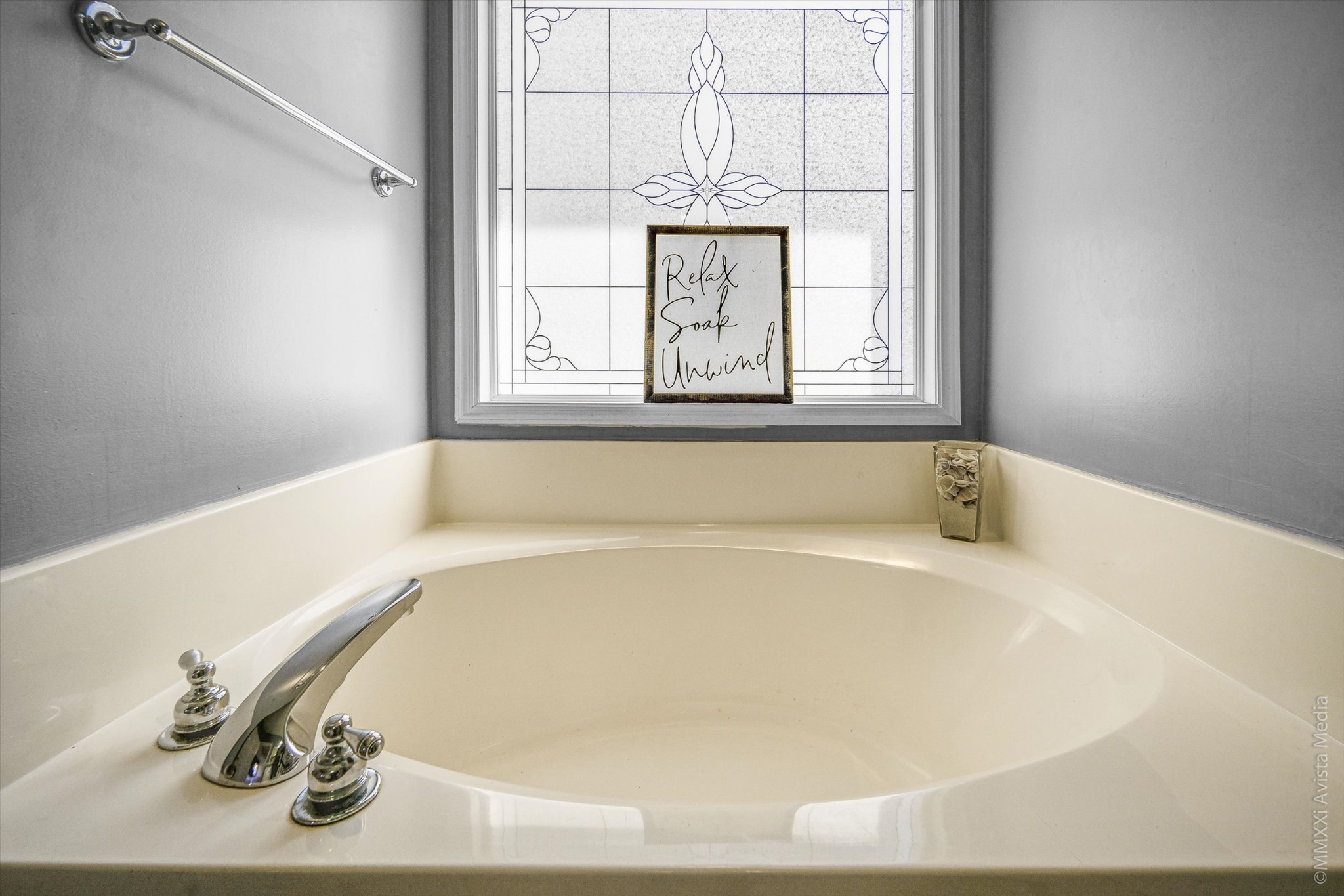 14908 Mt Pleasant Road Rockvale, TN 37153 - Photo 15 of 33 a white bath tub sitting in a bathroom next to a window