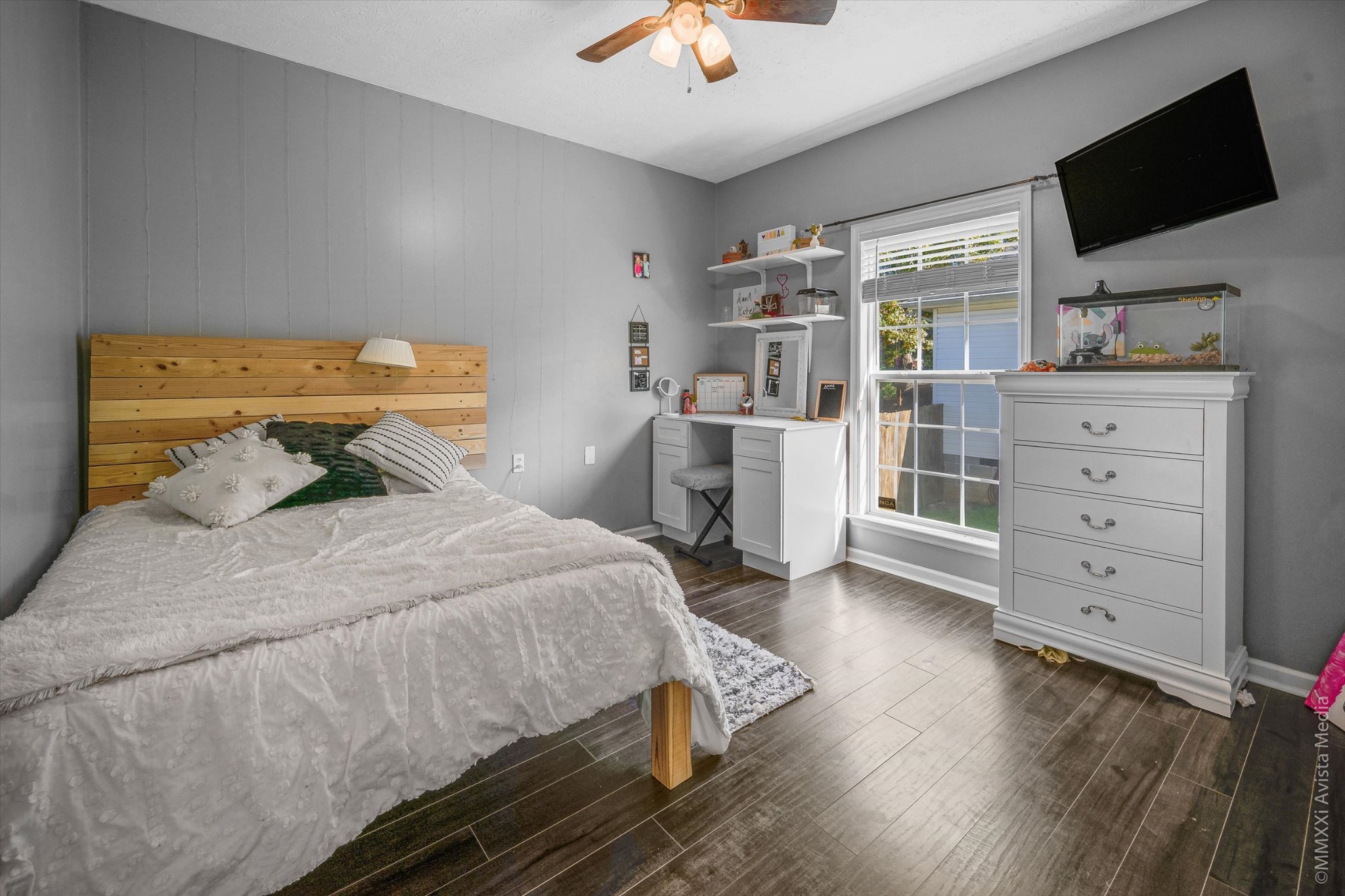 14908 Mt Pleasant Road Rockvale, TN 37153 - Photo 17 of 33 a bedroom with a bed and flat screen tv