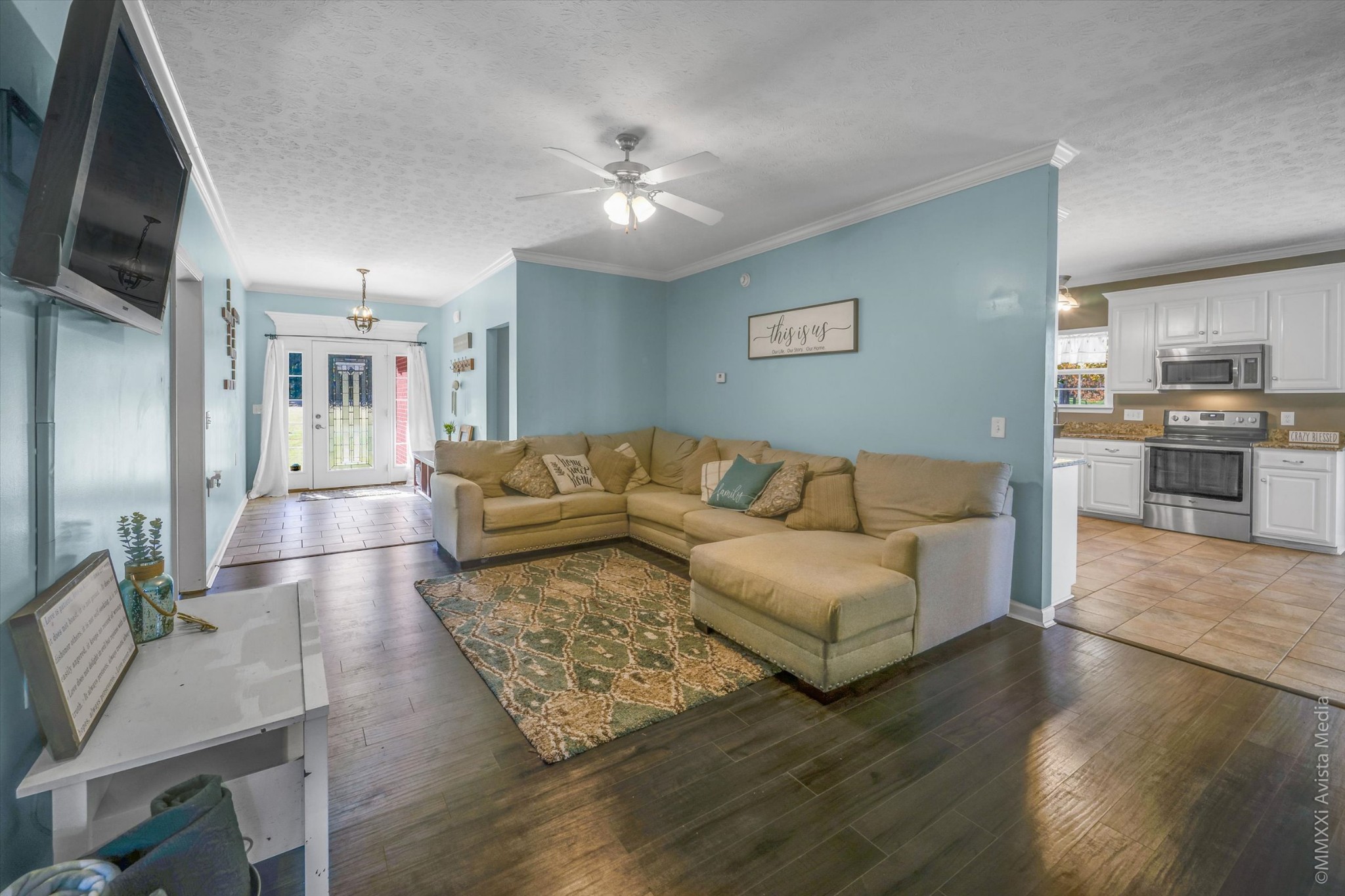 14908 Mt Pleasant Road Rockvale, TN 37153 - Photo 3 of 33 a living room with furniture and a chandelier