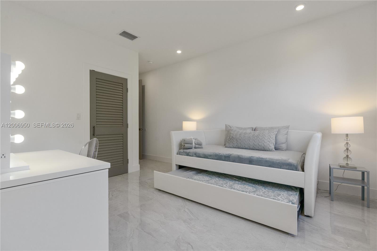 2889 Southwest 33rd Avenue, Unit 2889 Miami, FL 33133 - Photo 6 of 38 a living room with furniture and a table