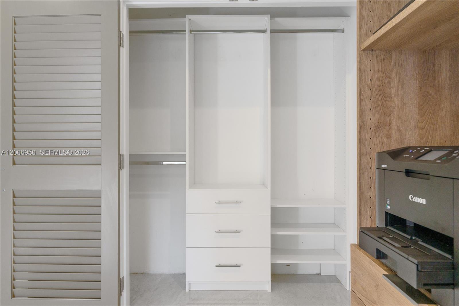 2889 Southwest 33rd Avenue, Unit 2889 Miami, FL 33133 - Photo 7 of 38 a view of walk in closet