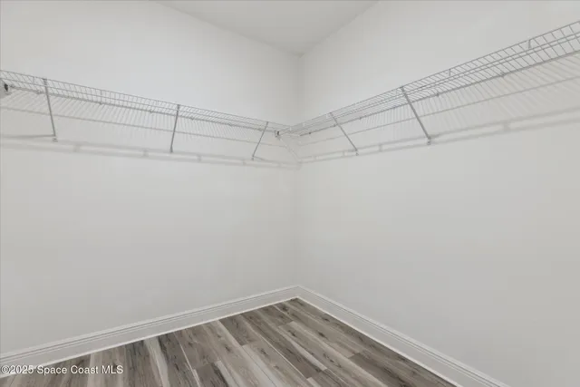 a view of a room with racks on the wall