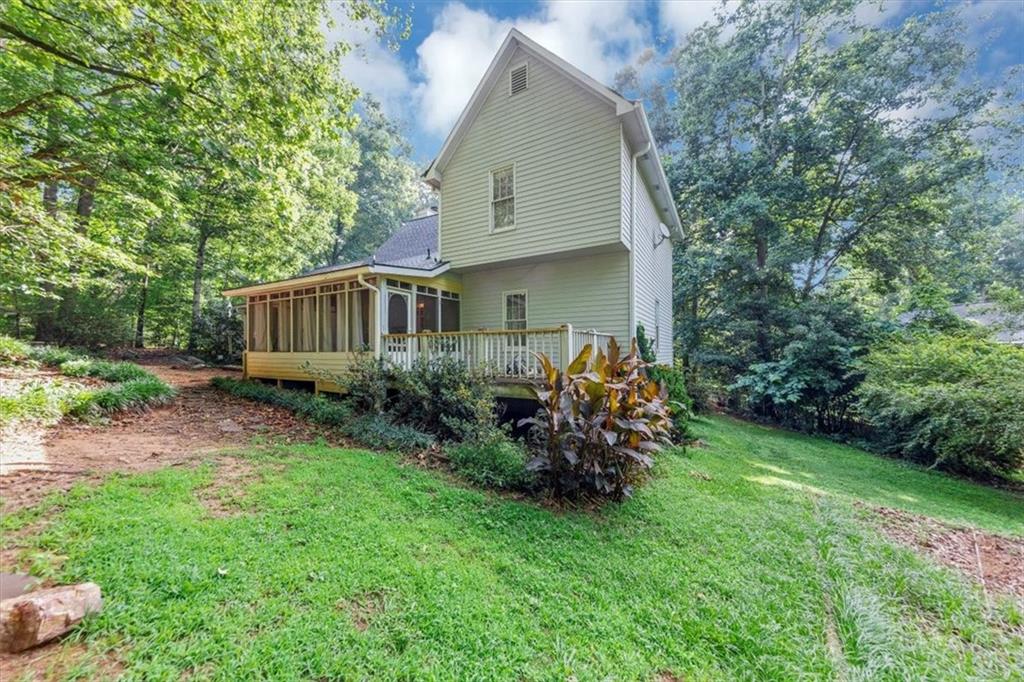 244 Freestone Lane Dallas, GA 30132 - Photo 26 of 26 a view of backyard with a garden and plants
