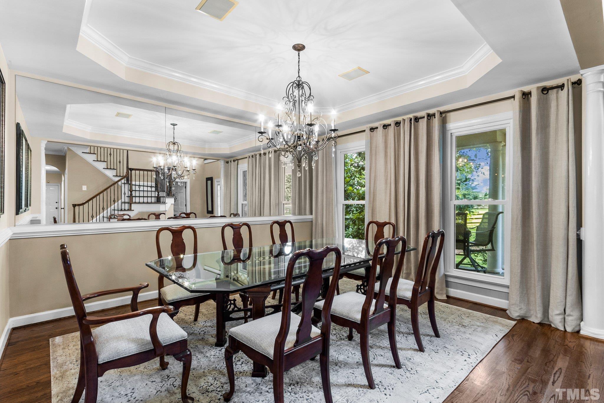 8737 Castleberry Road Apex, NC 27523 - Photo 29 of 99 a view of a dining room with furniture window and outside view