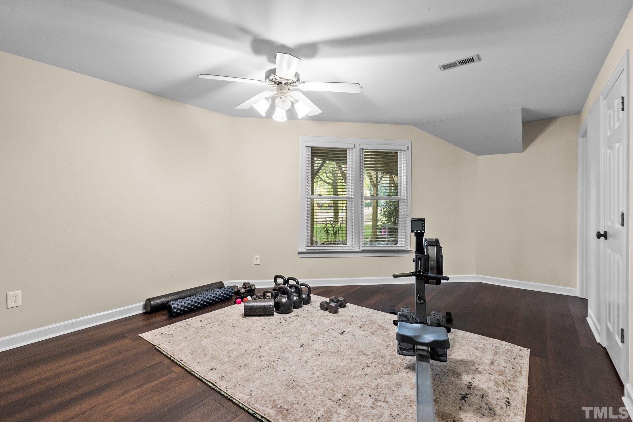 8737 Castleberry Road Apex, NC 27523 - Photo 70 of 99 Lower level flex space with closets and next to full bath