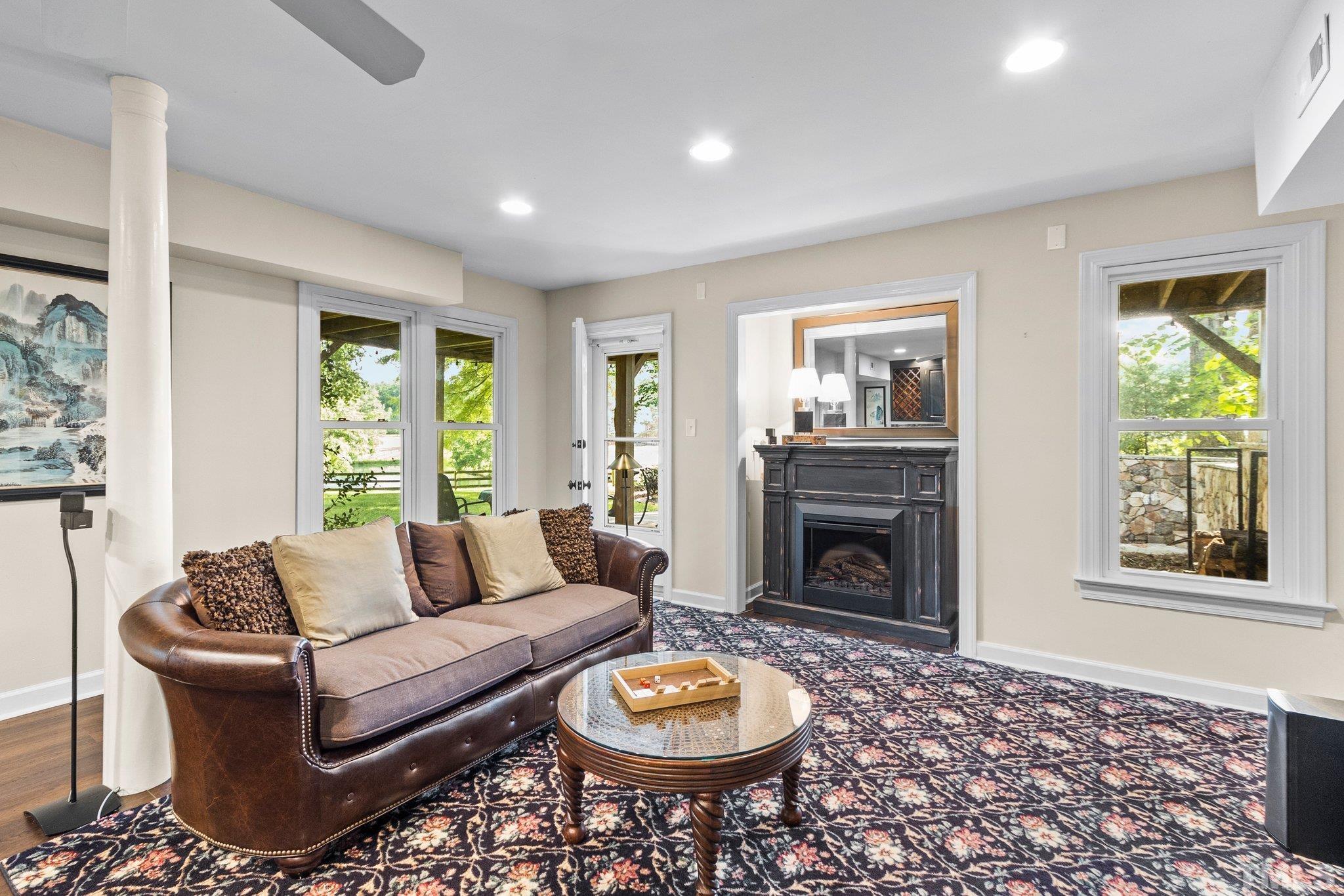 8737 Castleberry Road Apex, NC 27523 - Photo 72 of 99 Lower level walk-out basement. Electric fireplace!