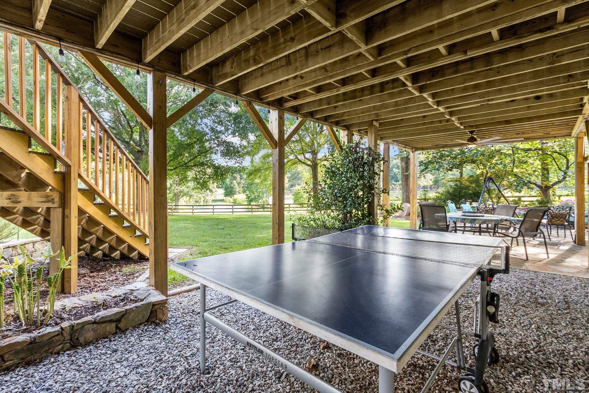 8737 Castleberry Road Apex, NC 27523 - Photo 96 of 99 a view of outdoor space with seating area