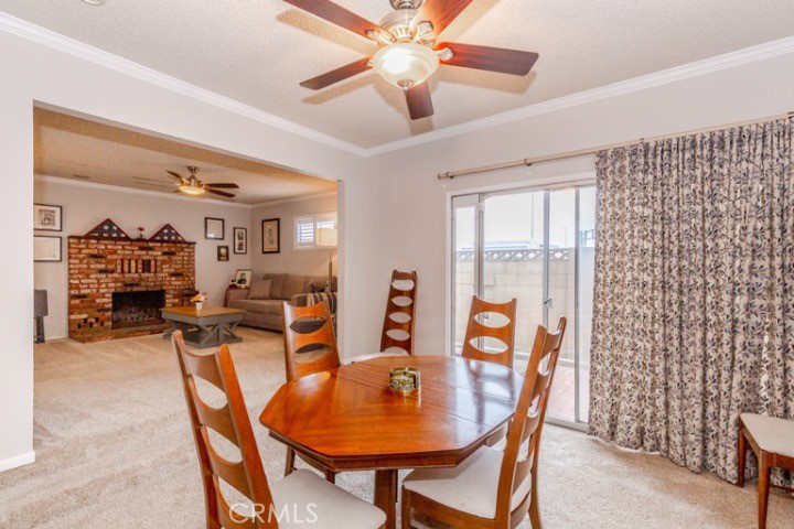 11229 Elmhurst Drive Norwalk, CA 90650 - Photo 12 of 54 a dining room with furniture and window