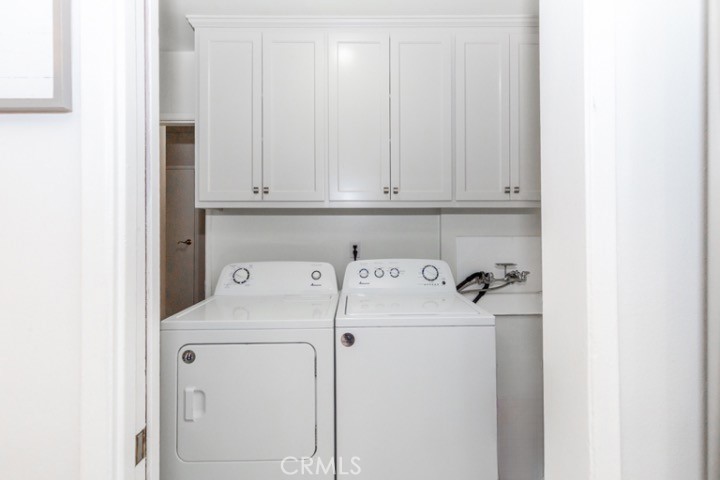 11229 Elmhurst Drive Norwalk, CA 90650 - Photo 23 of 54 a utility room with dryer and washer