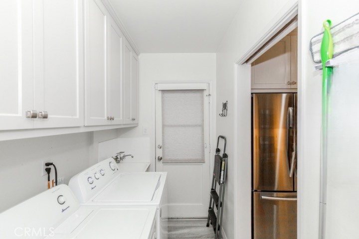 11229 Elmhurst Drive Norwalk, CA 90650 - Photo 24 of 54 a bathroom with a sink and a mirror