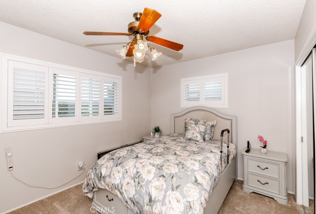 11229 Elmhurst Drive Norwalk, CA 90650 - Photo 39 of 54 a bedroom with a bed and a dresser