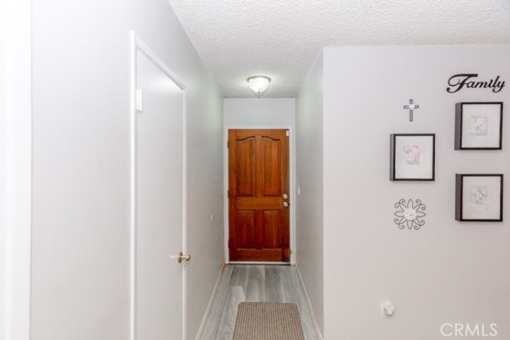 11229 Elmhurst Drive Norwalk, CA 90650 - Photo 42 of 54 a view of a hallway with elevator