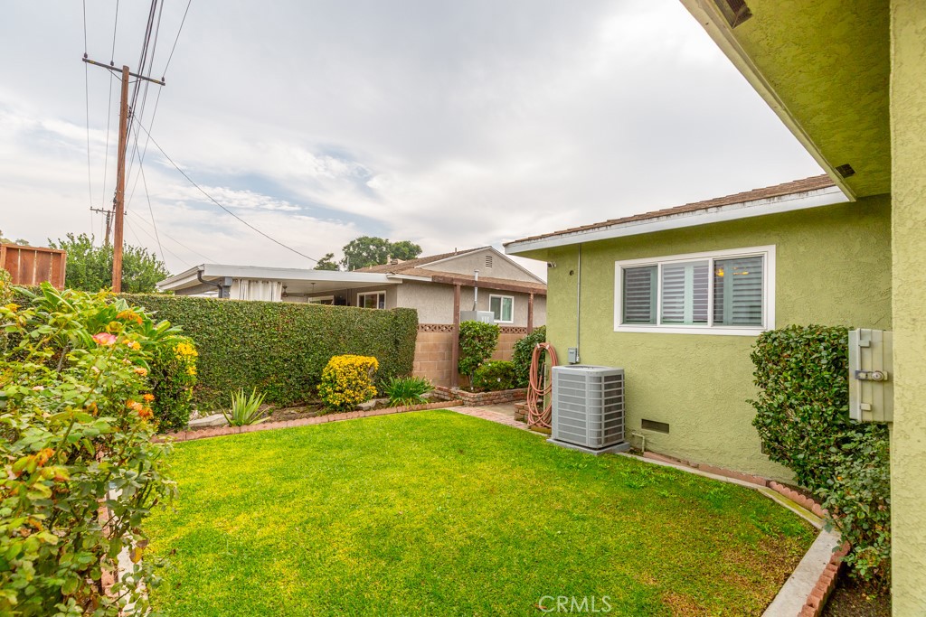 11229 Elmhurst Drive Norwalk, CA 90650 - Photo 43 of 54 a balcony with table and chairs