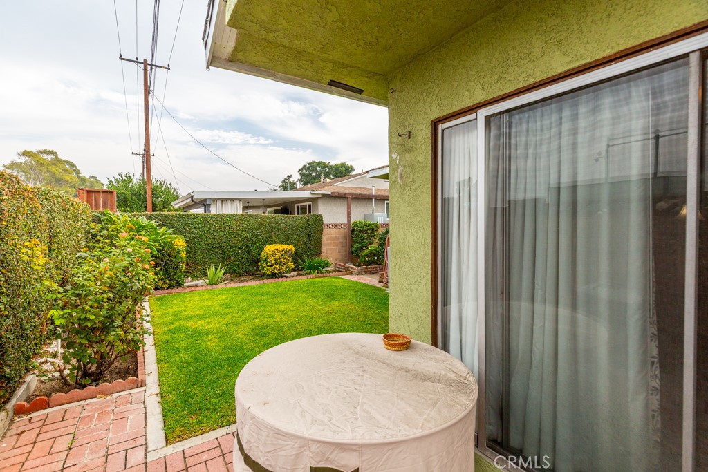 11229 Elmhurst Drive Norwalk, CA 90650 - Photo 46 of 54 a view of a backyard with plants and a patio