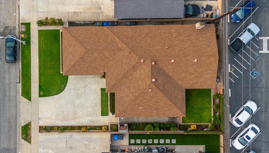 11229 Elmhurst Drive Norwalk, CA 90650 - Photo 49 of 54 front view of a house with a street