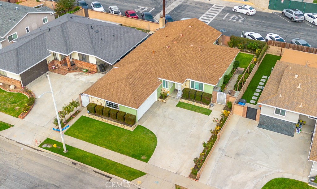 11229 Elmhurst Drive Norwalk, CA 90650 - Photo 50 of 54 an aerial view of a house with a yard