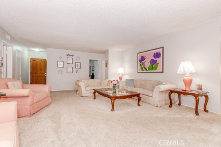 11229 Elmhurst Drive Norwalk, CA 90650 - Photo 7 of 54 a living room with furniture