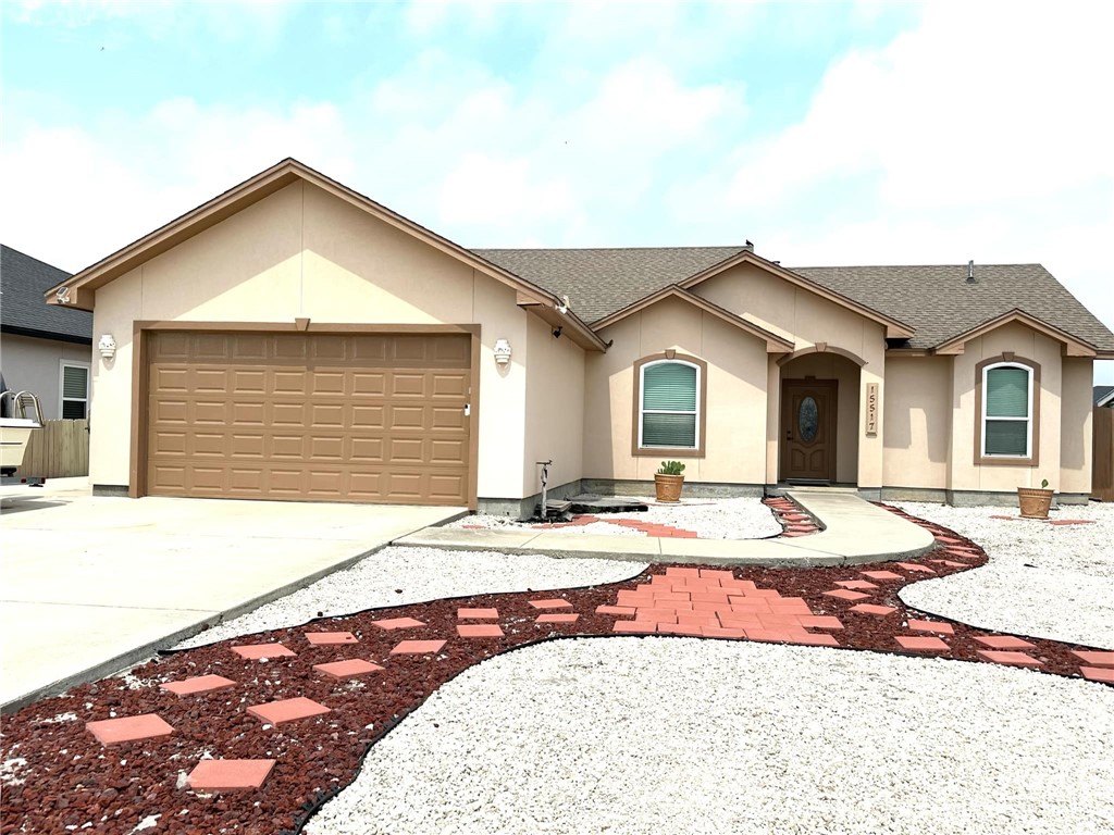 15517 Dyna Street Corpus Christi, TX 78418 - Photo 1 of 16 a view of house with backyard and space