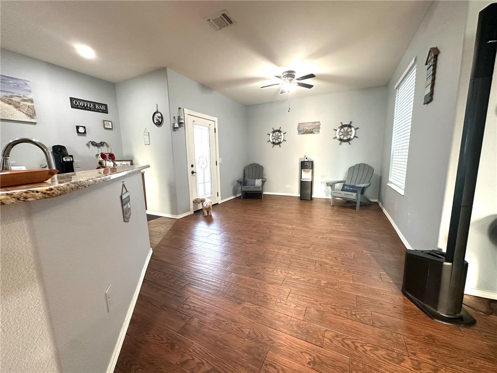 15517 Dyna Street Corpus Christi, TX 78418 - Photo 11 of 16 a view of living room with furniture and a wooden floor
