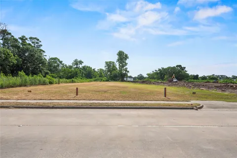 a view of a swimming pool and a yard
