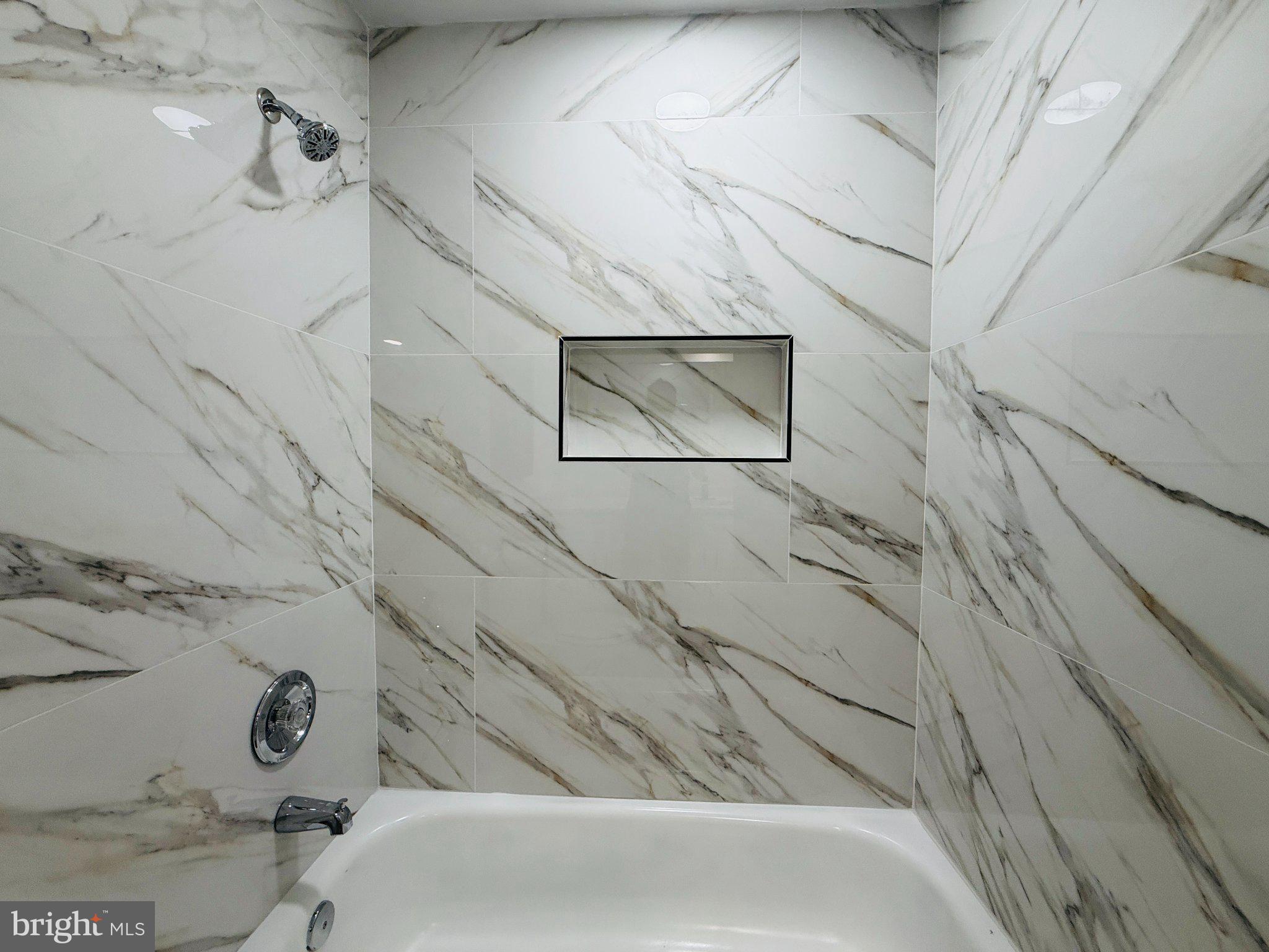 815 Whitehall Street Silver Spring, MD 20901 - Photo 20 of 39 Elegant marble shower retreat.