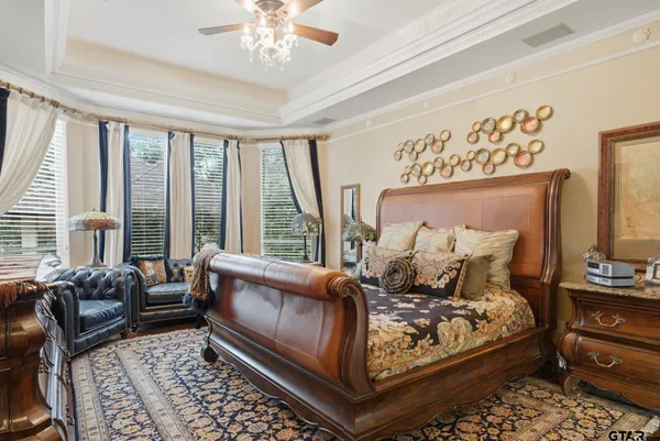 a bed room with a bed and a couch