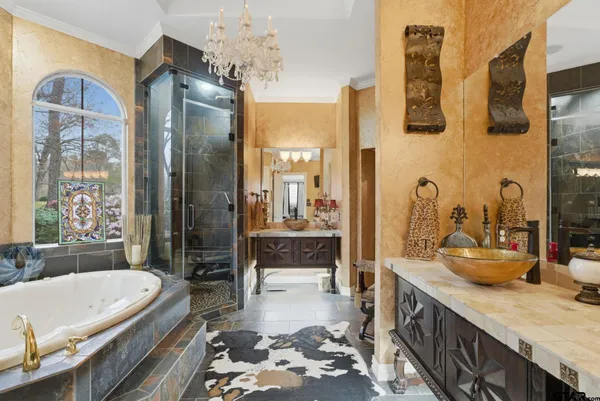 a living room with furniture a projector and screen