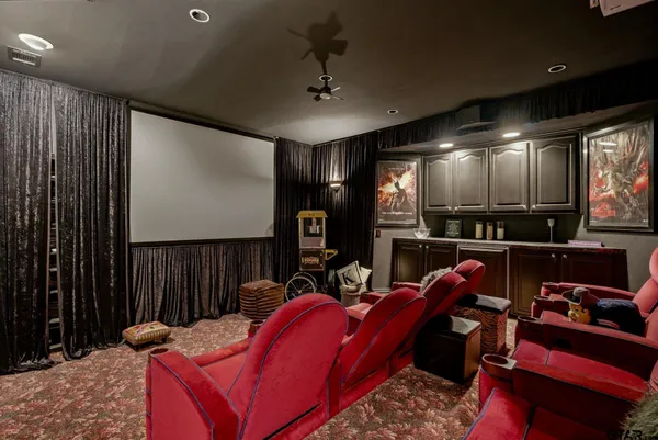 a kitchen with stainless steel appliances granite countertop a sink and stove