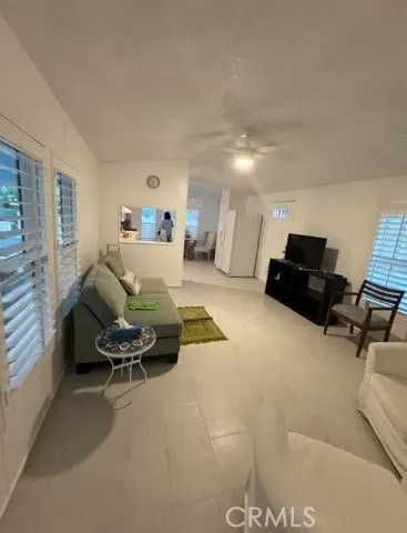 a utility room with cabinets a washer and dryer