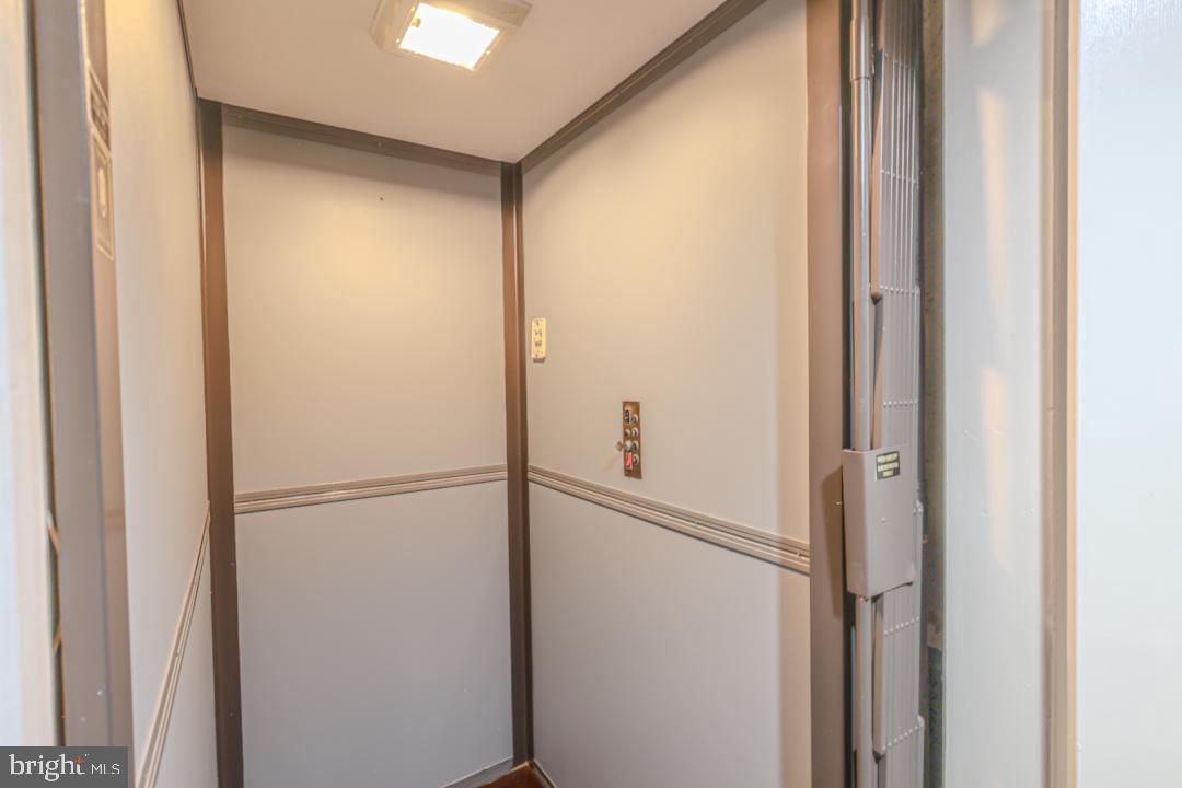 1139 Scott Street Baltimore, MD 21230 - Photo 18 of 60 a bathroom with a glass shower door