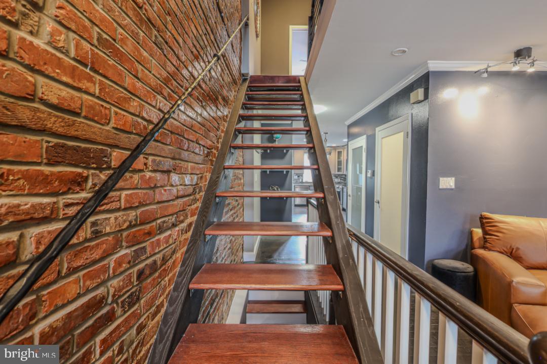 1139 Scott Street Baltimore, MD 21230 - Photo 23 of 60 a view of entryway with wooden floor and stairs