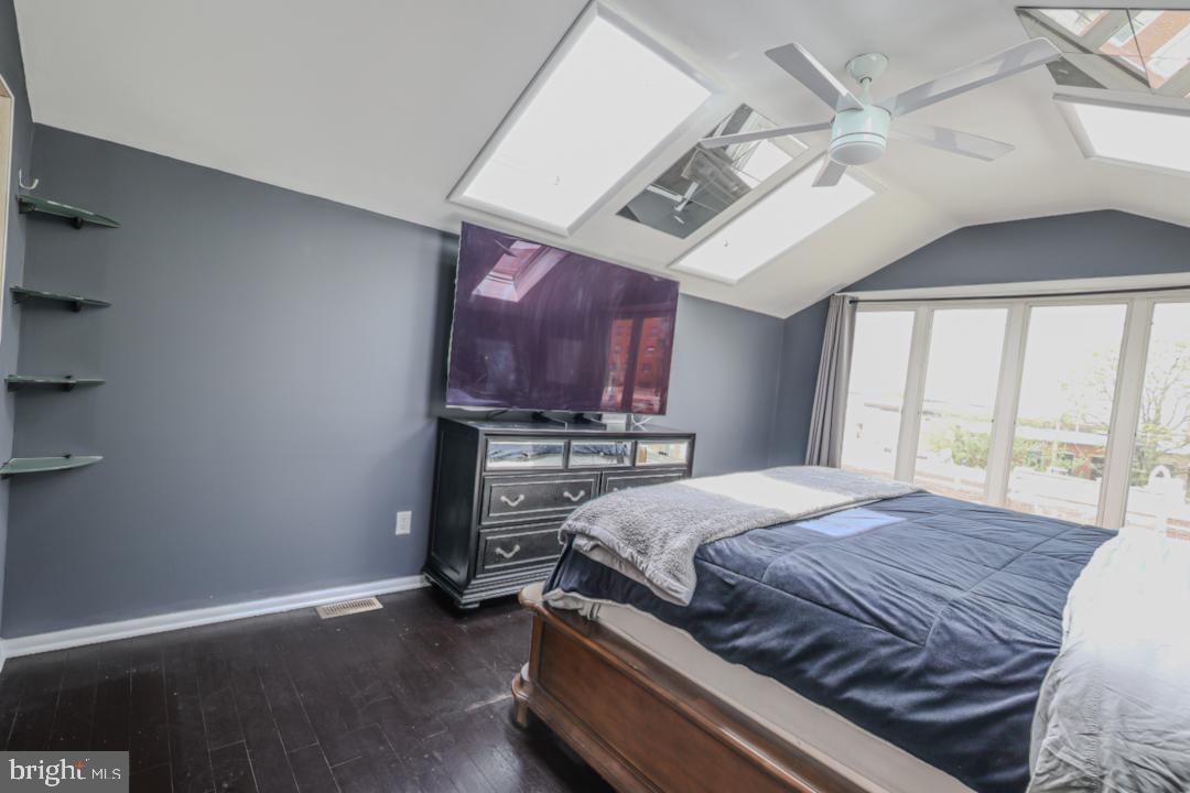 1139 Scott Street Baltimore, MD 21230 - Photo 39 of 60 a bedroom with a bed and a window