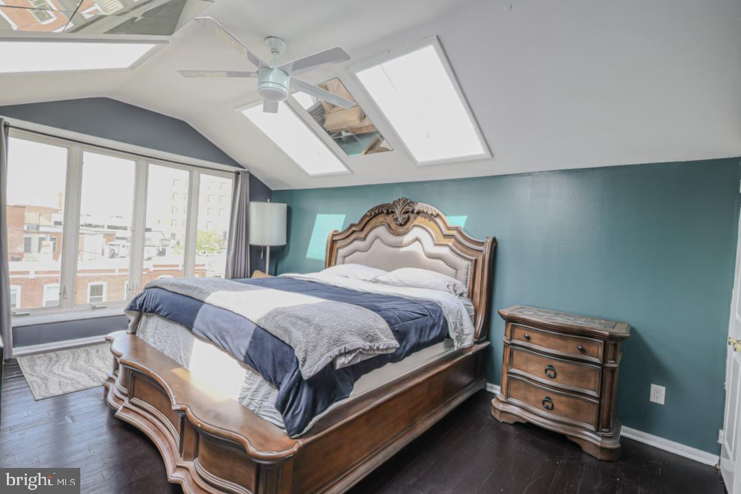1139 Scott Street Baltimore, MD 21230 - Photo 40 of 60 a bedroom with a bed and a ceiling fan