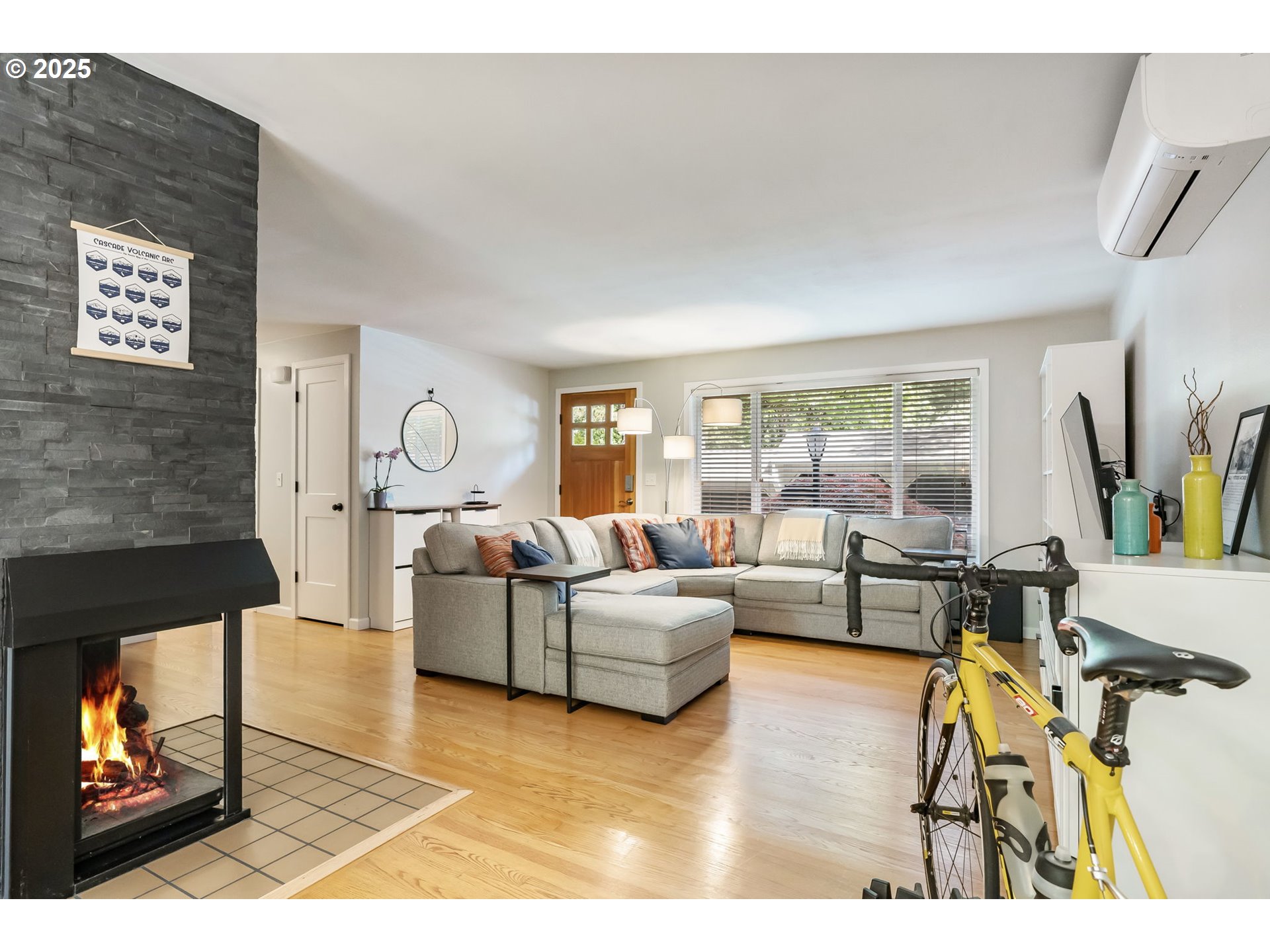 4560 Northwest Barnes Road Portland, OR 97210 - Photo 14 of 36 a living room with furniture and a fireplace