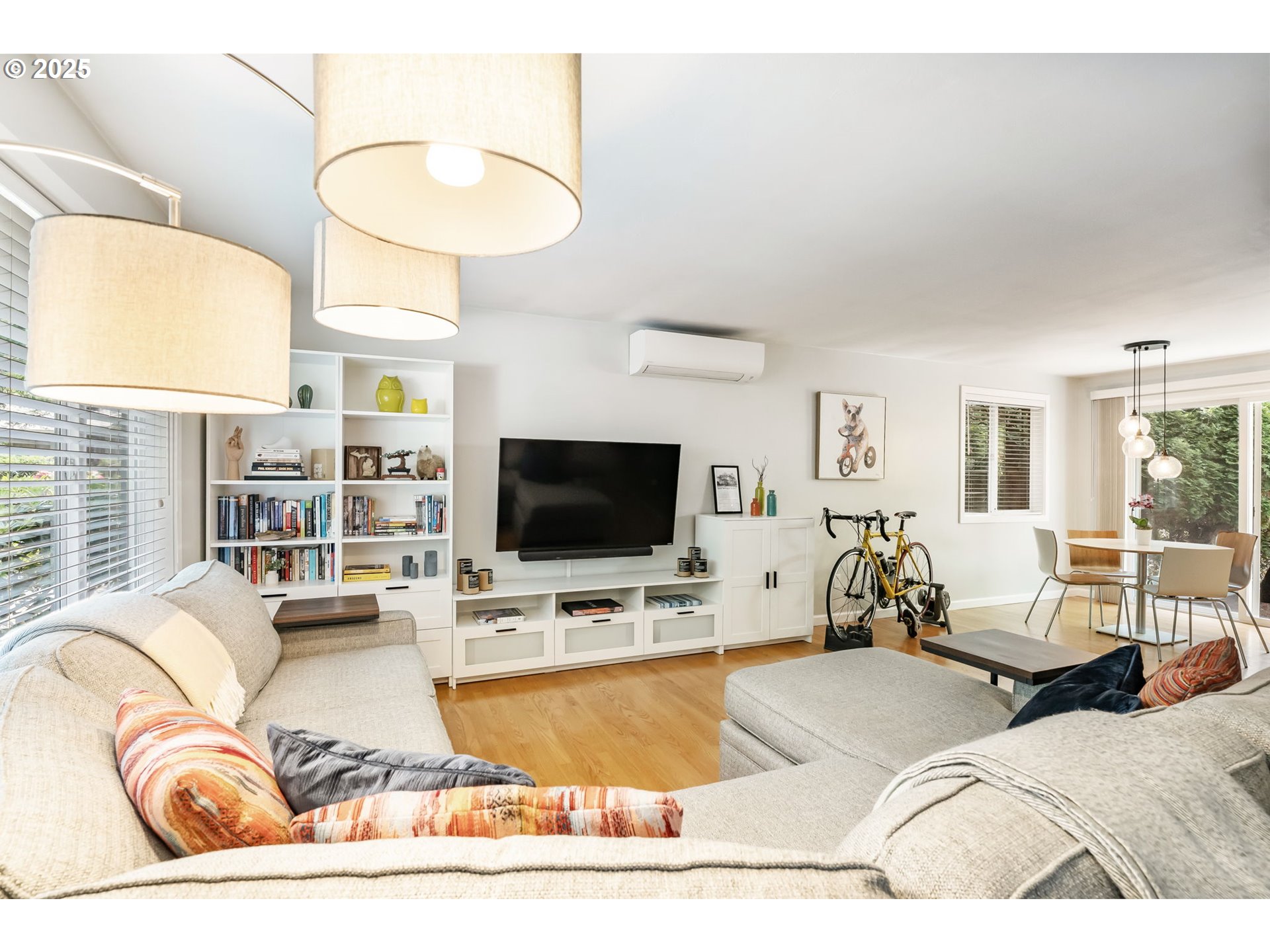 4560 Northwest Barnes Road Portland, OR 97210 - Photo 3 of 36 a living room with furniture and a flat screen tv