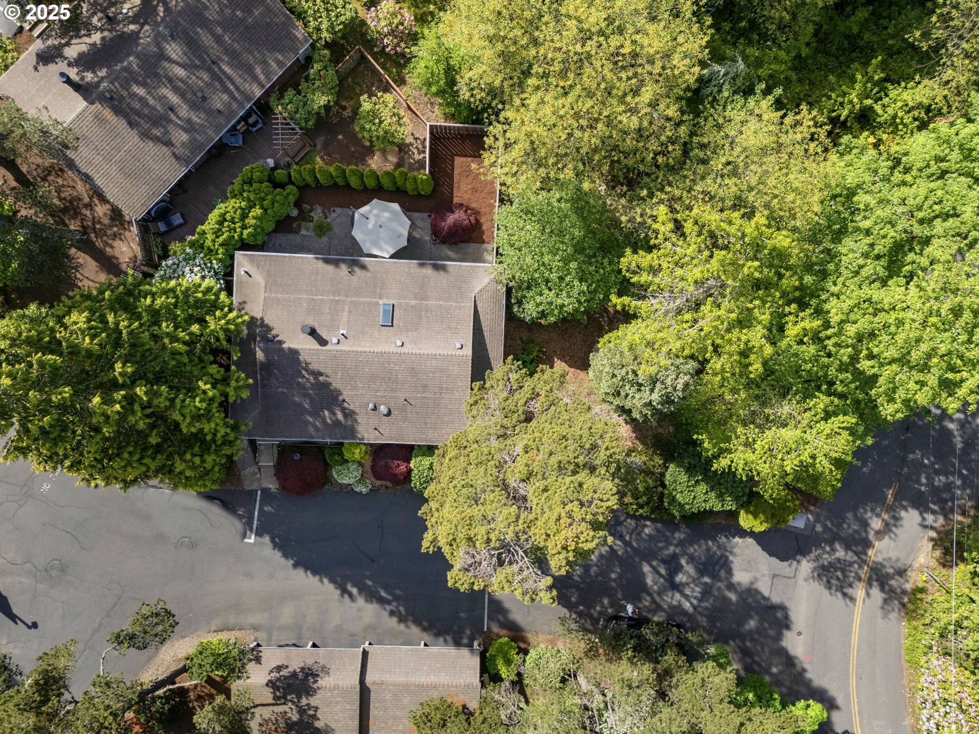 4560 Northwest Barnes Road Portland, OR 97210 - Photo 31 of 36 an aerial view of a house with outdoor space