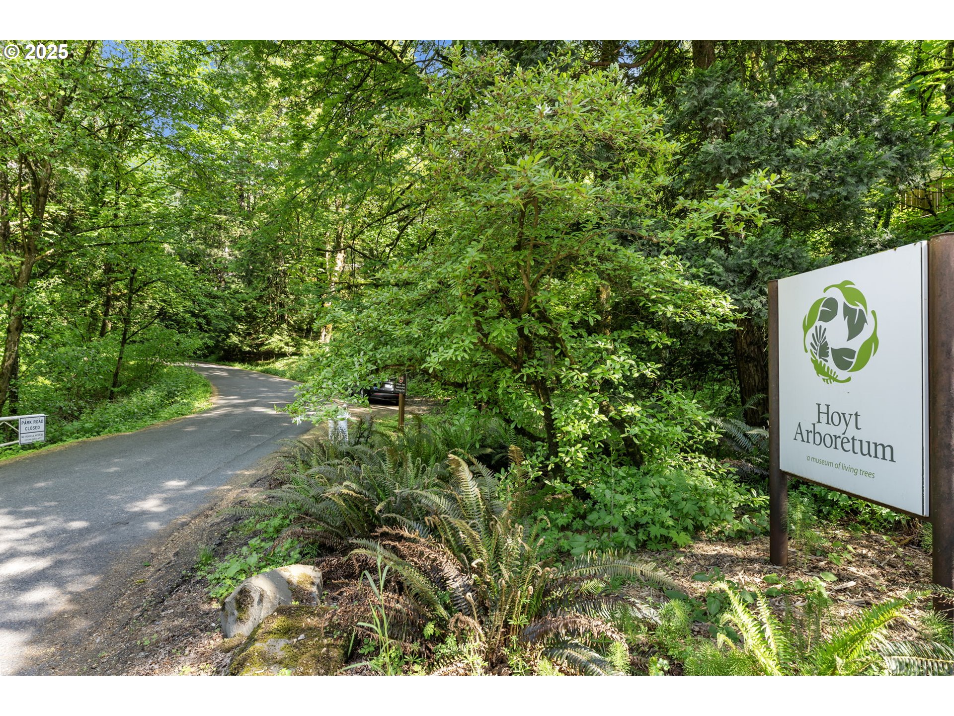 4560 Northwest Barnes Road Portland, OR 97210 - Photo 34 of 36 a sign that is sitting in the middle of a field
