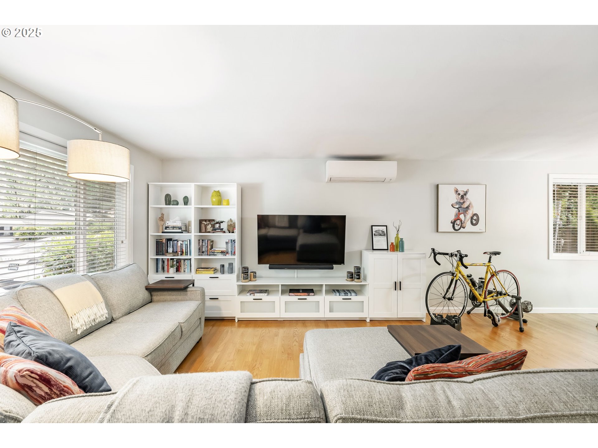4560 Northwest Barnes Road Portland, OR 97210 - Photo 5 of 36 a living room with furniture and a flat screen tv