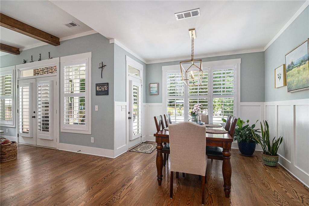 1229 Dean Hill Road Southeast Monroe, GA 30655 - Photo 12 of 51 a view of a dining room with furniture window and wooden floor