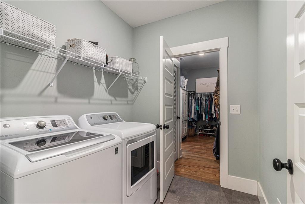 1229 Dean Hill Road Southeast Monroe, GA 30655 - Photo 17 of 51 a utility room with dryer and washer