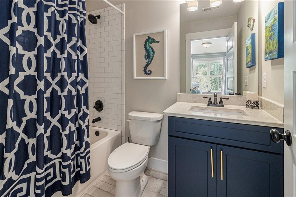 1229 Dean Hill Road Southeast Monroe, GA 30655 - Photo 27 of 51 a bathroom with a sink and a toilet