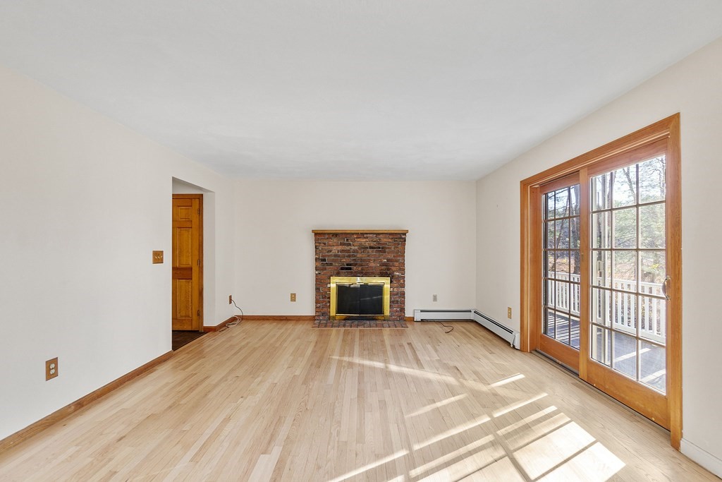 462 Lowell Road Groton, MA 01450 - Photo 11 of 42 an empty room with windows