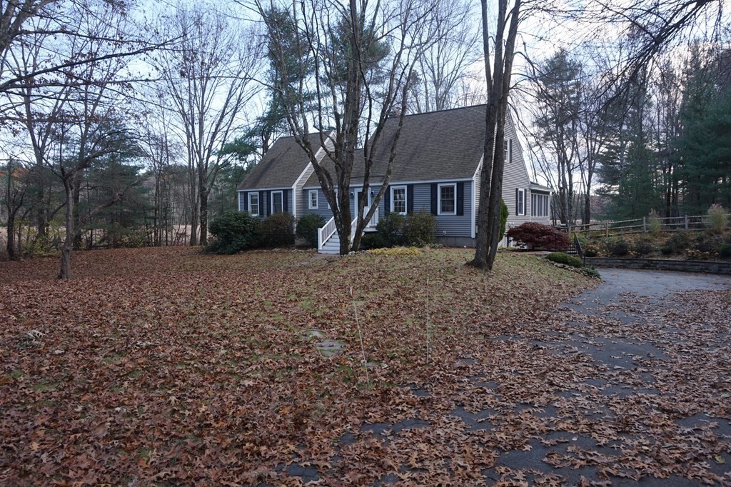 462 Lowell Road Groton, MA 01450 - Photo 2 of 42 a view of a house with a yard