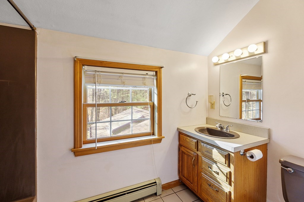 462 Lowell Road Groton, MA 01450 - Photo 21 of 42 a kitchen with stainless steel appliances granite countertop a stove and a sink