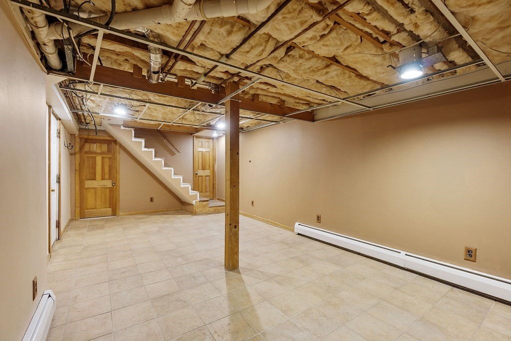 462 Lowell Road Groton, MA 01450 - Photo 22 of 42 a view of a room with lots of yellow walls