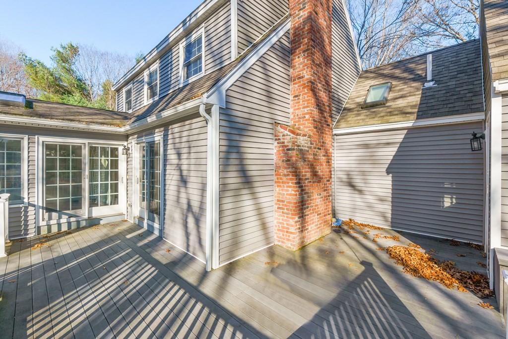 462 Lowell Road Groton, MA 01450 - Photo 25 of 42 a view of a house with a large window