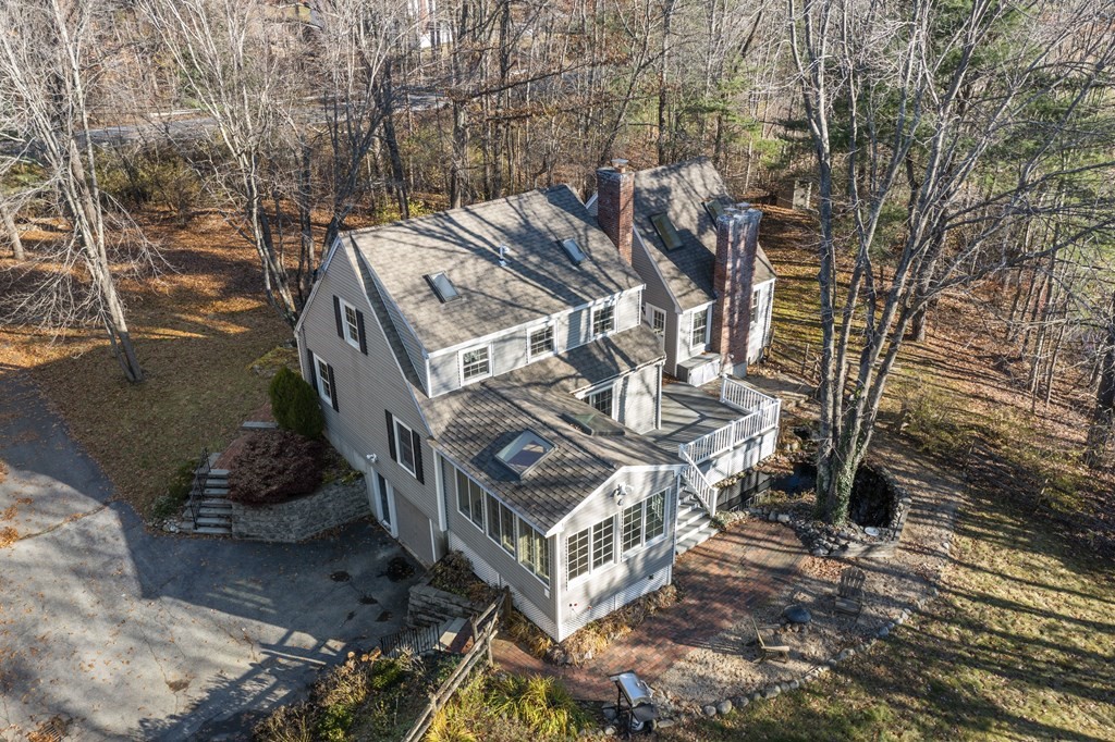 462 Lowell Road Groton, MA 01450 - Photo 34 of 42 a view of a house with a yard