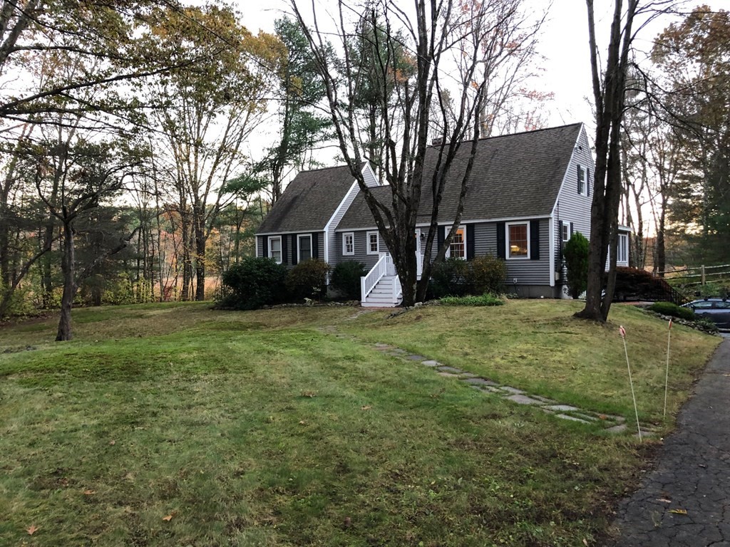 462 Lowell Road Groton, MA 01450 - Photo 42 of 42 a front view of house with yard and green space