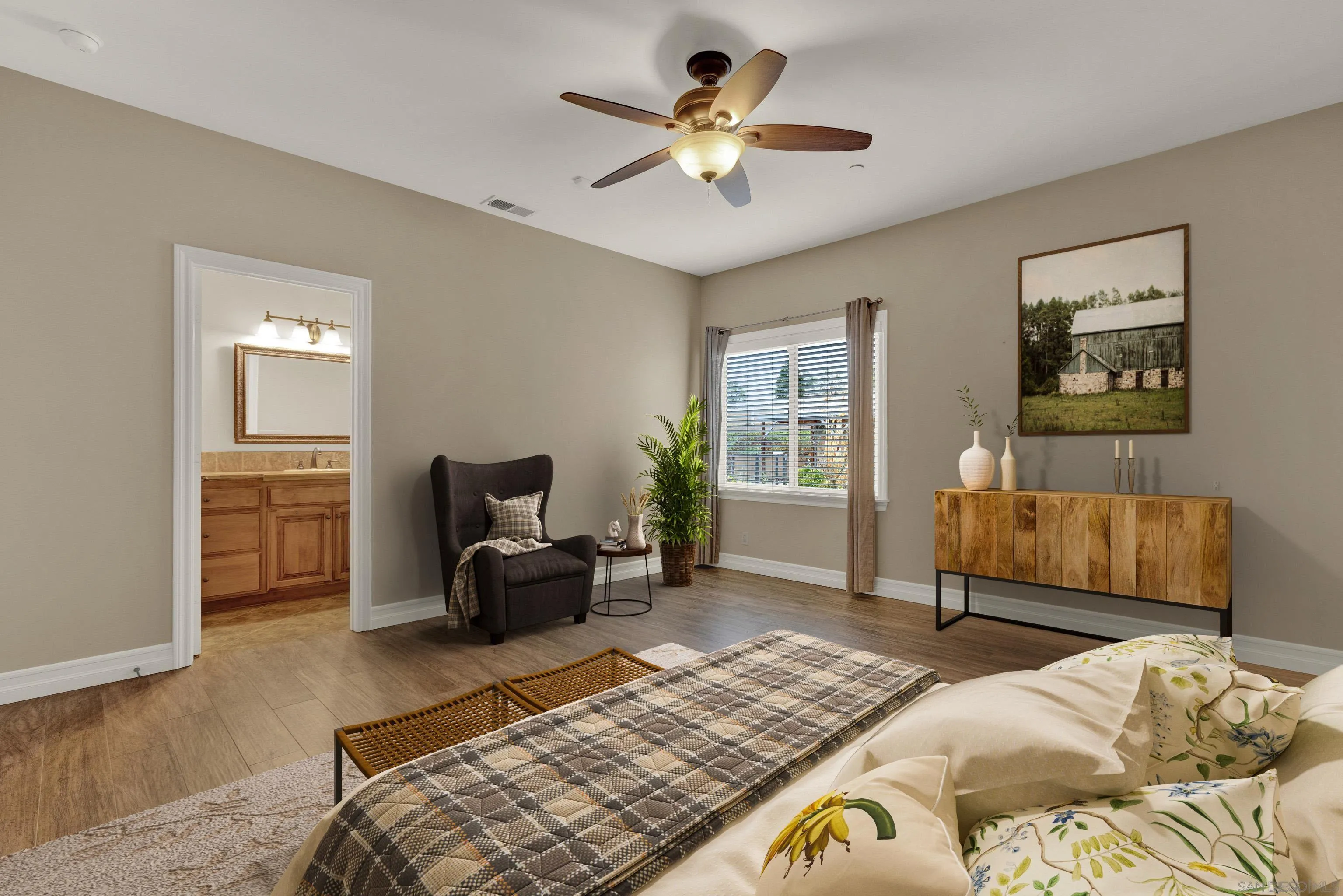 940 Heritage Ranch Road Ramona, CA 92065 - Photo 15 of 26 a bedroom with a bed and a couch
